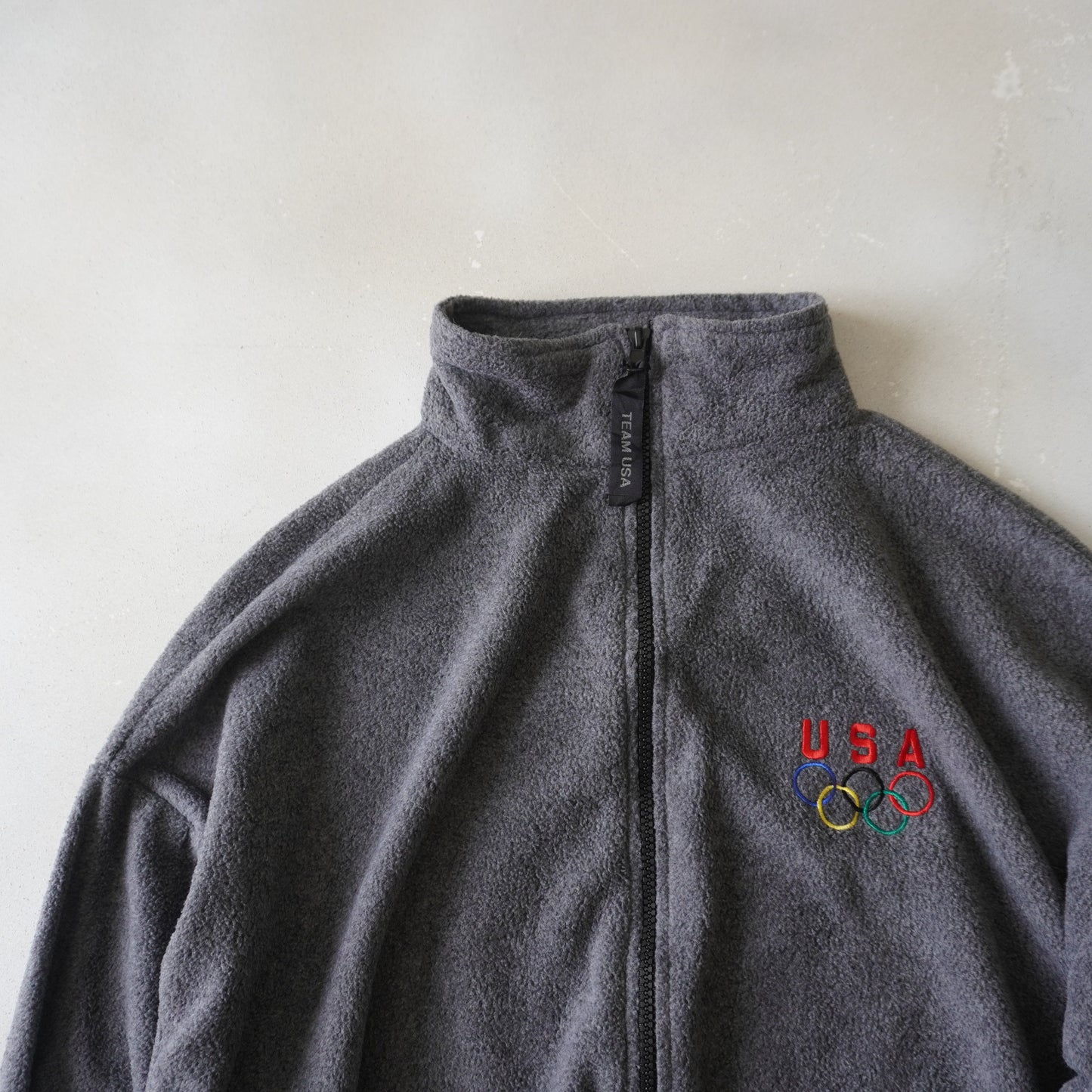 Thrifted - Polar OLYMPIC USA Gris / Talla L,  60 ancho,66 largo. 