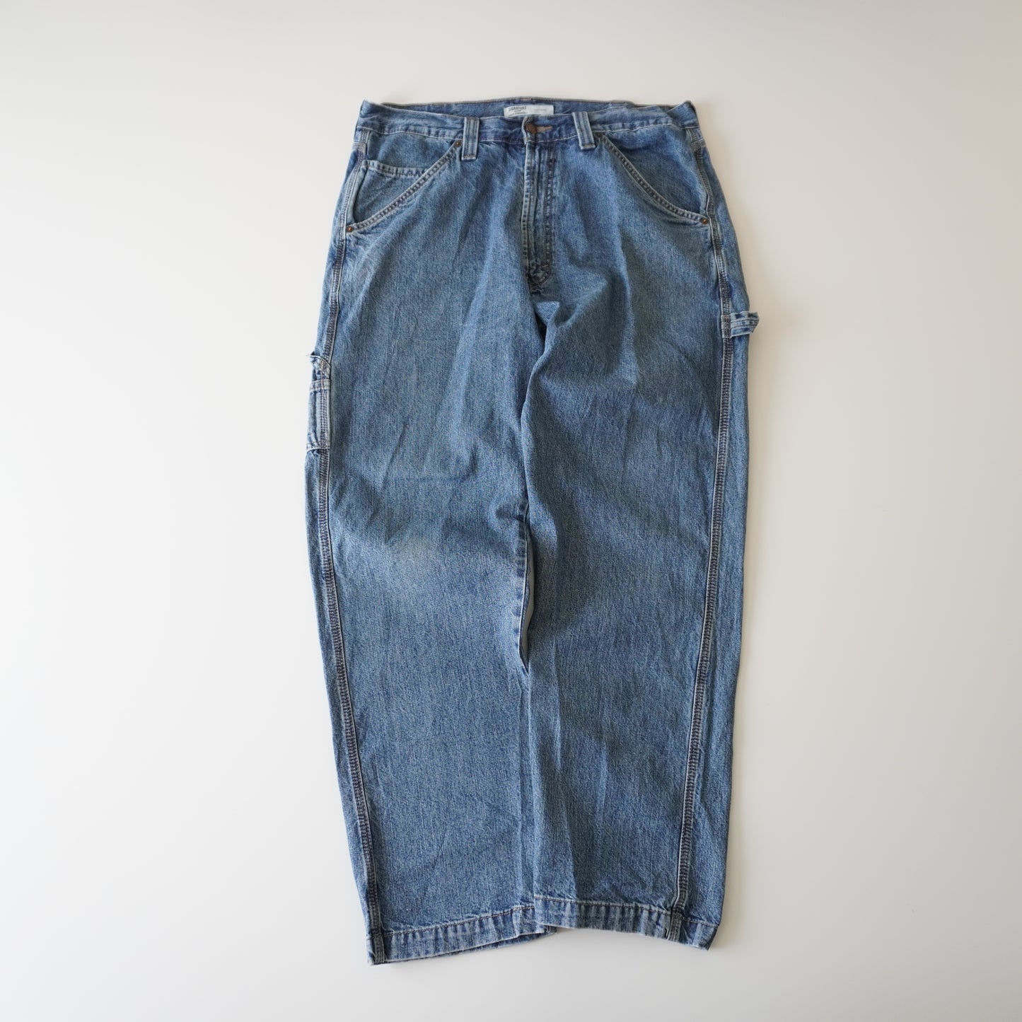 Thrifted – Jean Carpenter Signature by Levi Strauss Talla 36x32 USA | Cintura 48 cm | Largo 109 cm | Talón 22 cm