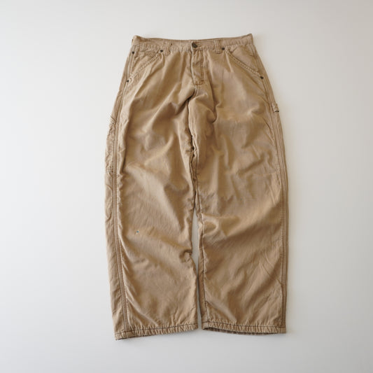 Thrifted – Jean Wrangler Café Beige con Interior Polar Talla 32x30 USA (CL 40-42) | Cintura 42 cm | Largo 97 cm | Talón 23 cm