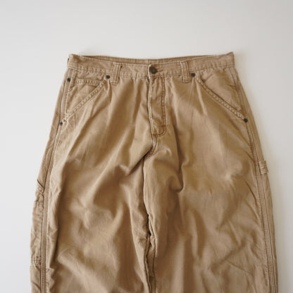 Thrifted – Jean Wrangler Café Beige con Interior Polar Talla 32x30 USA (CL 40-42) | Cintura 42 cm | Largo 97 cm | Talón 23 cm