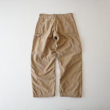 Thrifted – Jean Wrangler Café Beige con Interior Polar Talla 32x30 USA (CL 40-42) | Cintura 42 cm | Largo 97 cm | Talón 23 cm