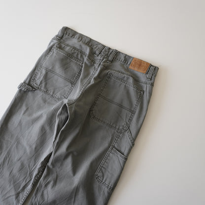 Thrifted – Jean Carpenter Verde Schmidt Workwear Talla 36x34 USA (CL 46-48) | Cintura 48 cm | Largo 110 cm | Talón 23.5 cm