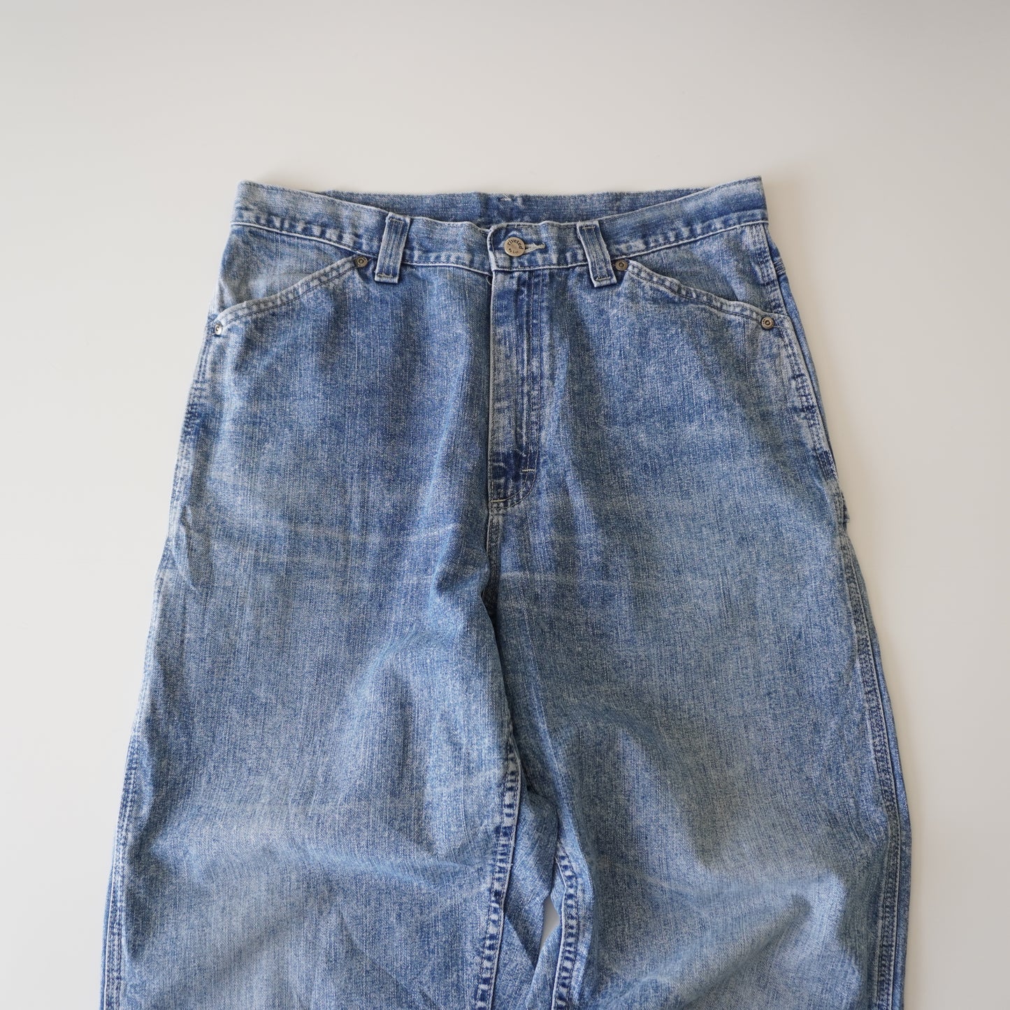 Thrifted – Jean Carpenter Riveted by Lee Talla 14-M USA (CL 42-44) | Cintura 44 cm | Largo 111 cm | Talón 22 cm