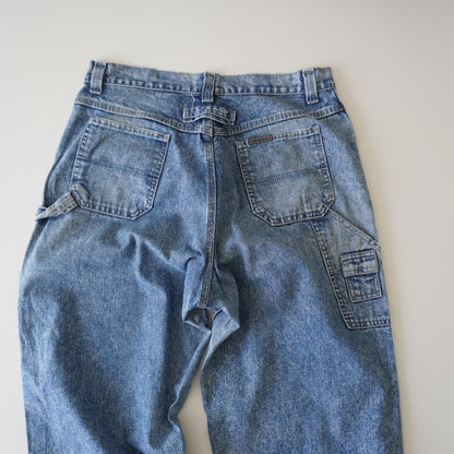 Thrifted – Jean Carpenter Riveted by Lee Talla 14-M USA (CL 42-44) | Cintura 44 cm | Largo 111 cm | Talón 22 cm