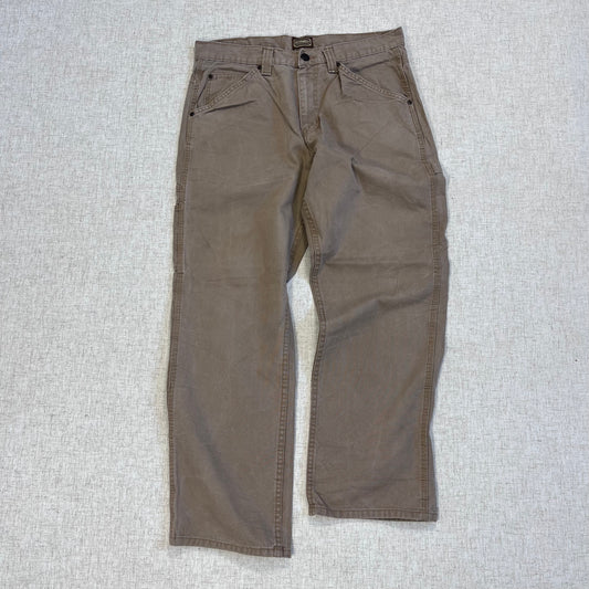 Thrifted – Jean Carpenter Café Claro Schmith Talla 34x30 USA (CL 48) | Cintura 45 cm | Largo 101 cm | Talón 23 cm