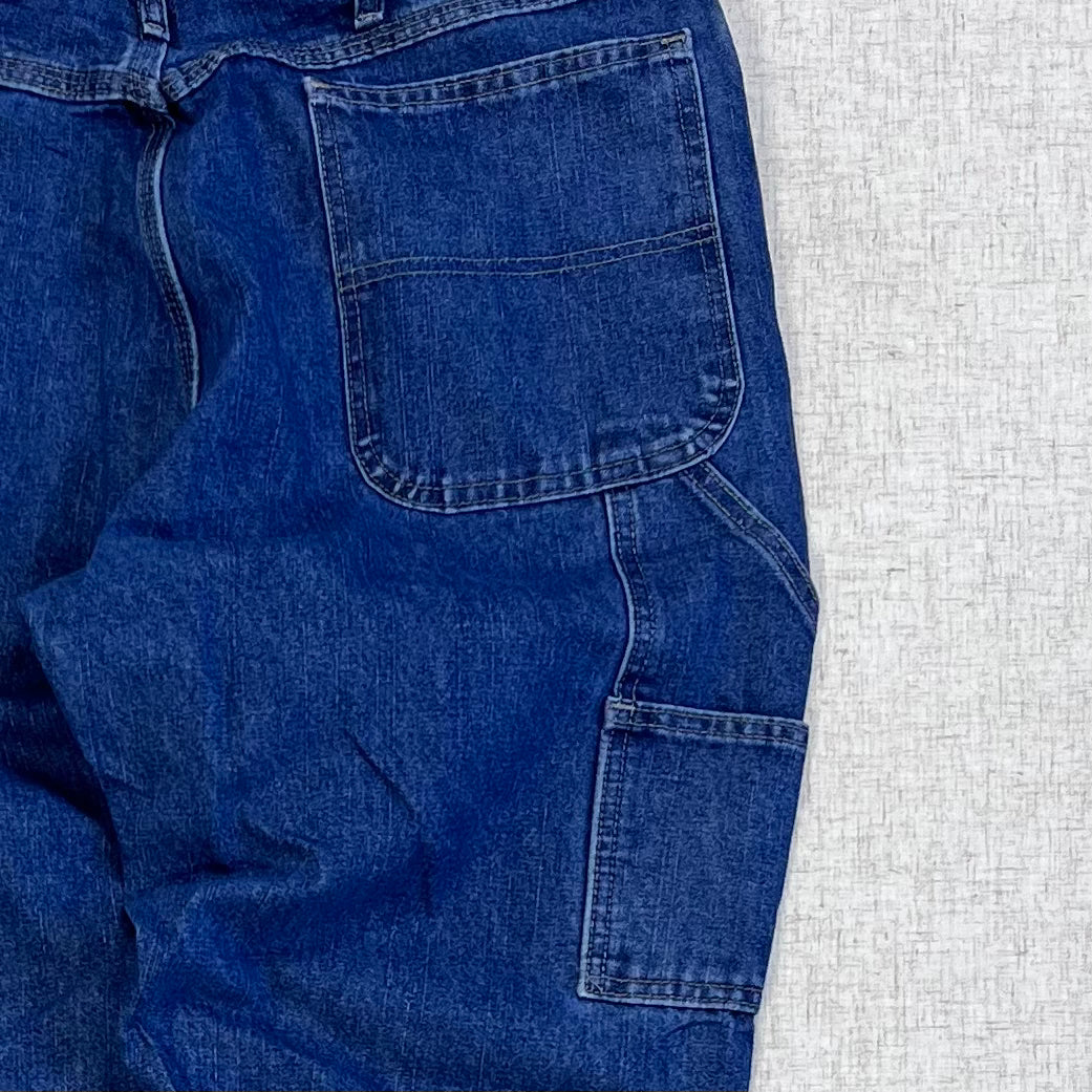 Thrifted – Jean Carpenter Denim Wrangler Talla 36x34 USA (CL 50–52) | Cintura 46 cm | Largo 114 cm | Talón 23 cm
