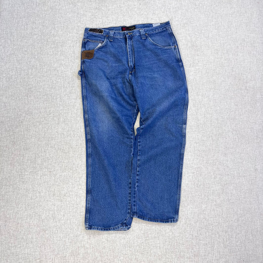 Thrifted – Jean Carpenter Denim Wrangler Riggs Talla 38x32 USA (CL 52–54) | Cintura 48 cm | Largo 109 cm | Talón 23 cm