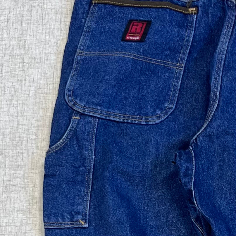 Thrifted – Jean Carpenter Denim Wrangler Riggs Talla 38x34 USA (CL 52–54) | Cintura 48 cm | Largo 105 cm | Talón 25 cm