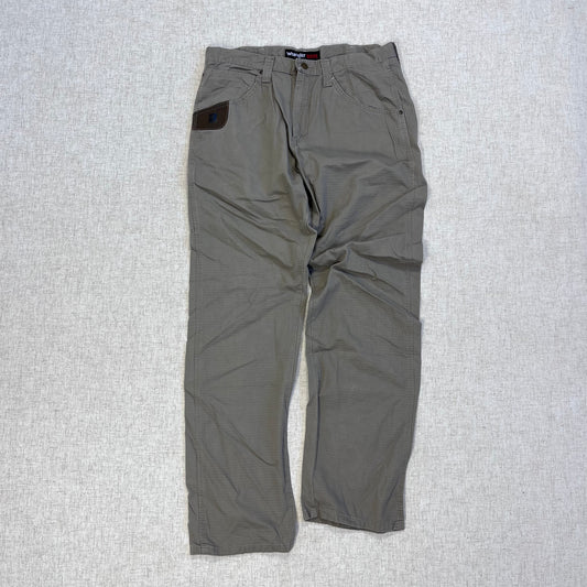 Thrifted – Jean Carpenter Gris Claro Wrangler Riggs Talla 34x32 USA (CL 48) | Cintura 45 cm | Largo 111 cm | Talón 22 cm