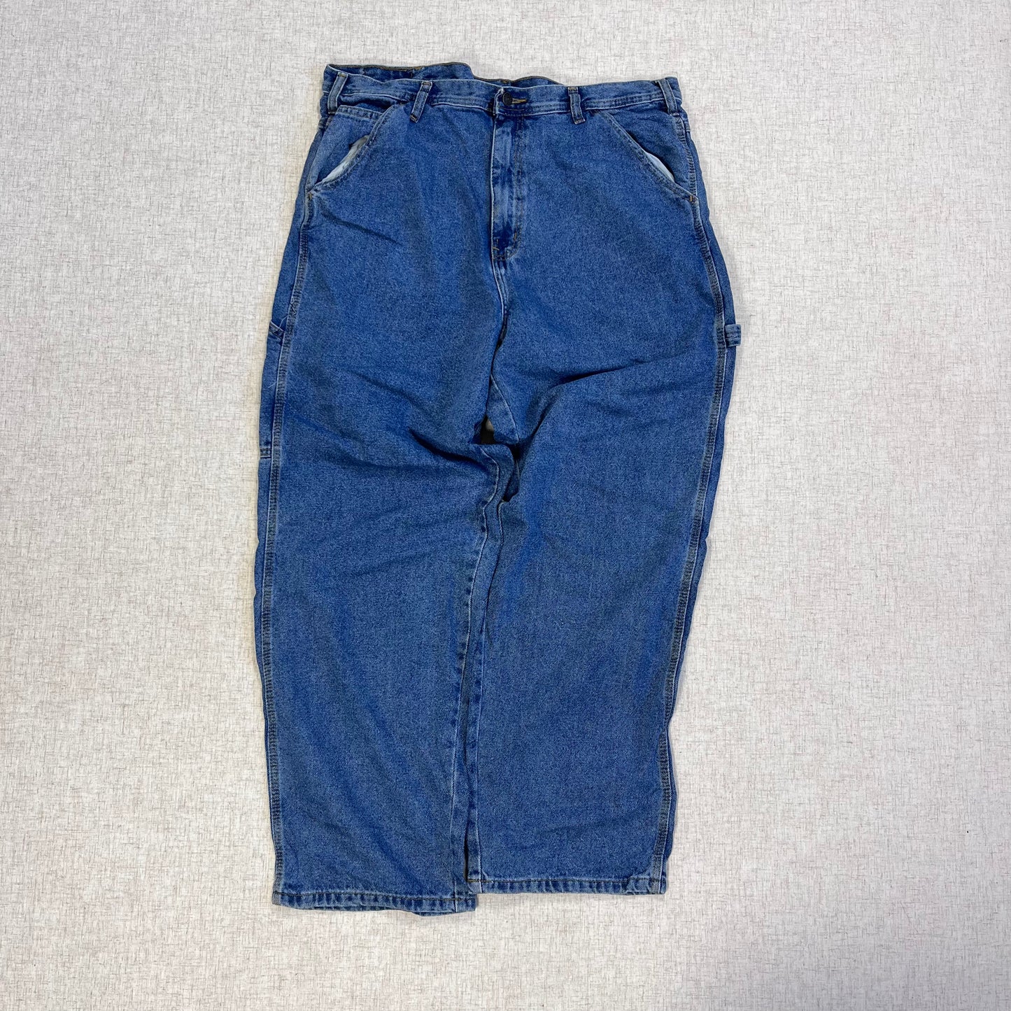 Thrifted – Jean Carpenter Denim Full Blue Talla 38x32 USA (CL 52–54) | Cintura 50 cm | Largo 115 cm | Talón 23 cm