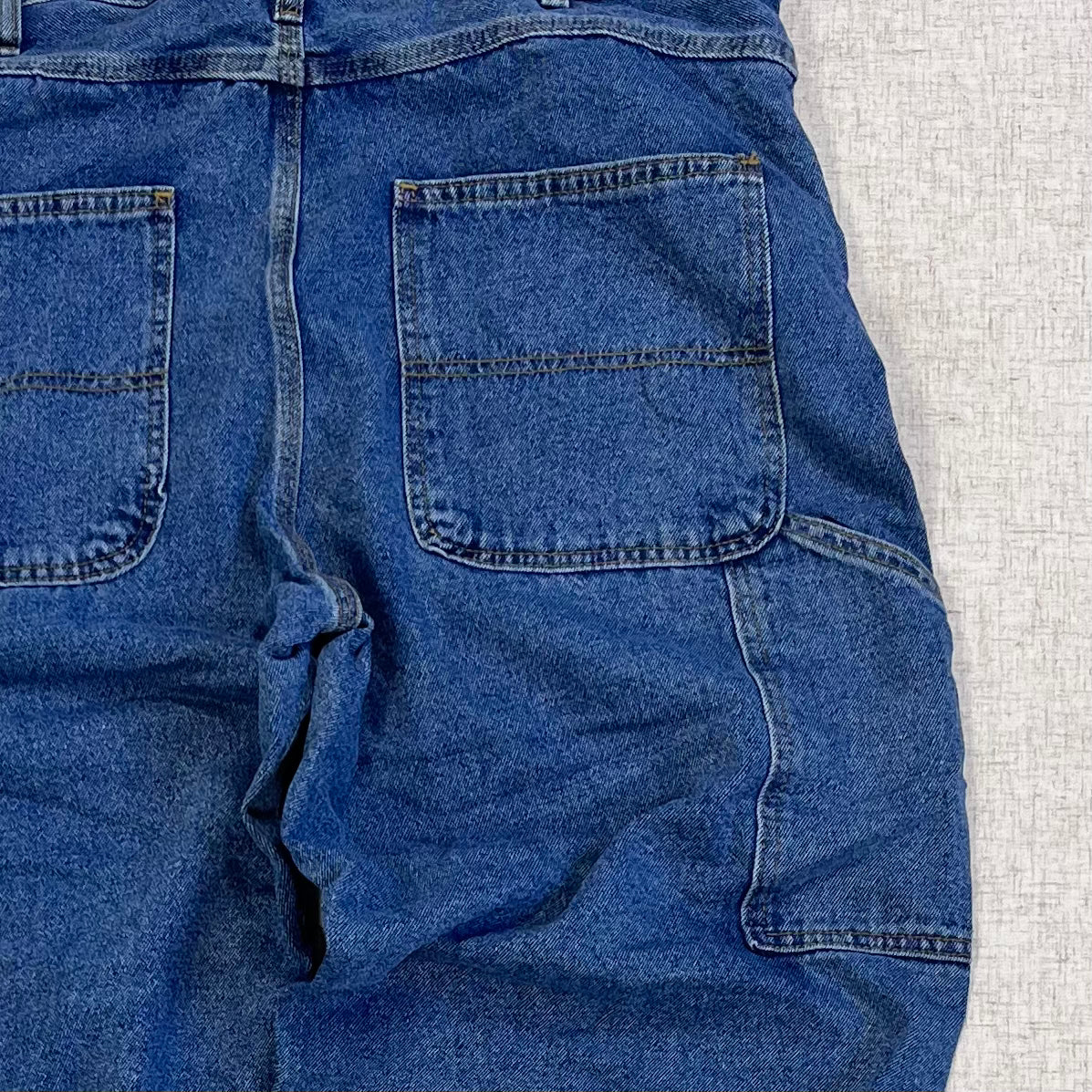 Thrifted – Jean Carpenter Denim Full Blue Talla 38x32 USA (CL 52–54) | Cintura 50 cm | Largo 115 cm | Talón 23 cm