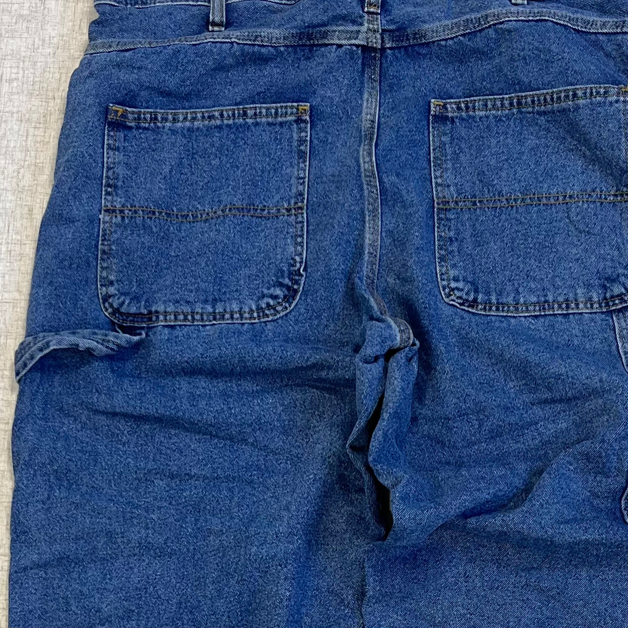 Thrifted – Jean Carpenter Denim Full Blue Talla 38x32 USA (CL 52–54) | Cintura 50 cm | Largo 115 cm | Talón 23 cm